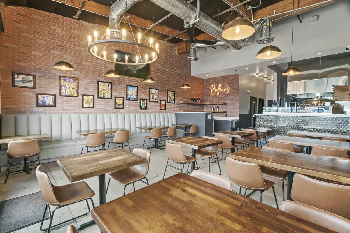 Contemporary commercial interior with open work areas designed by Satin & Slate