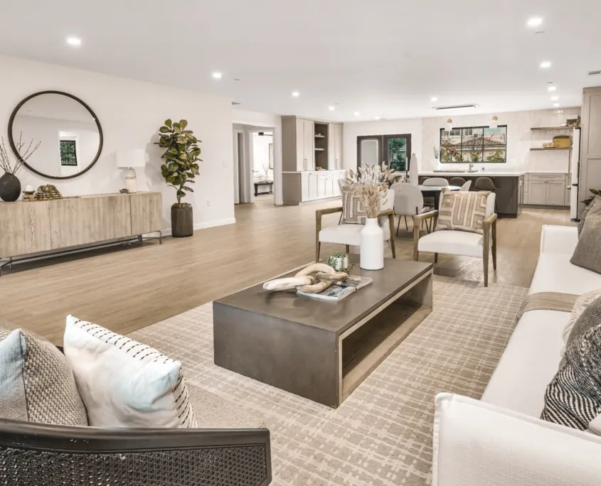 Bright Charlemagne home interior with layered furnishings